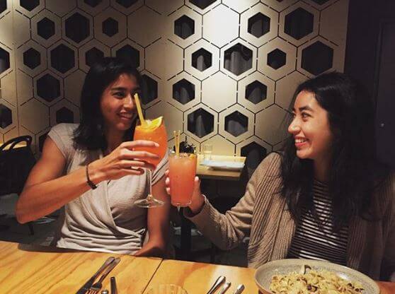 Astra Sharma with her sister on her 21st birthday.